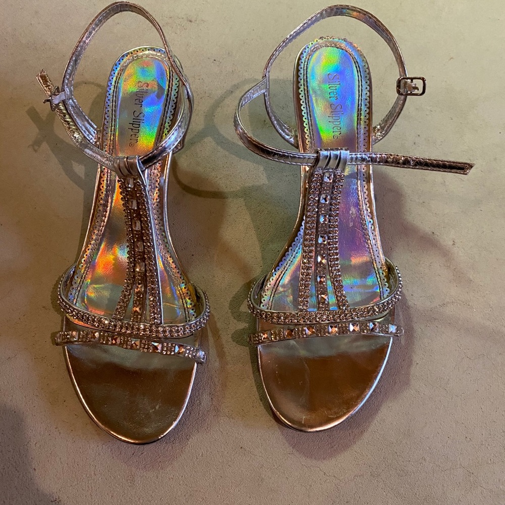 Silver jeweled heels.